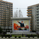 Image for article titled Communist Leaders Are Still Watching Us in These Monumental Portraits
